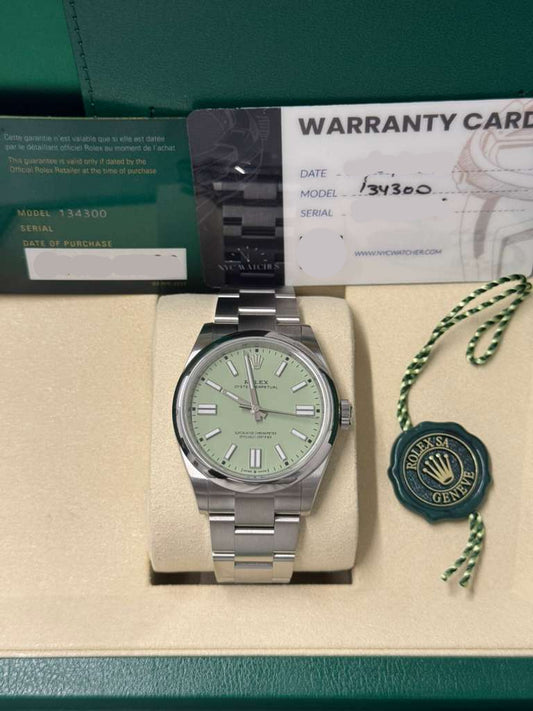 Rolex Oyster Perpetual - Stainless Steel - 41 MM - Oyster Bracelet - Pistachio Dial - Domed Bezel - 134300-0006