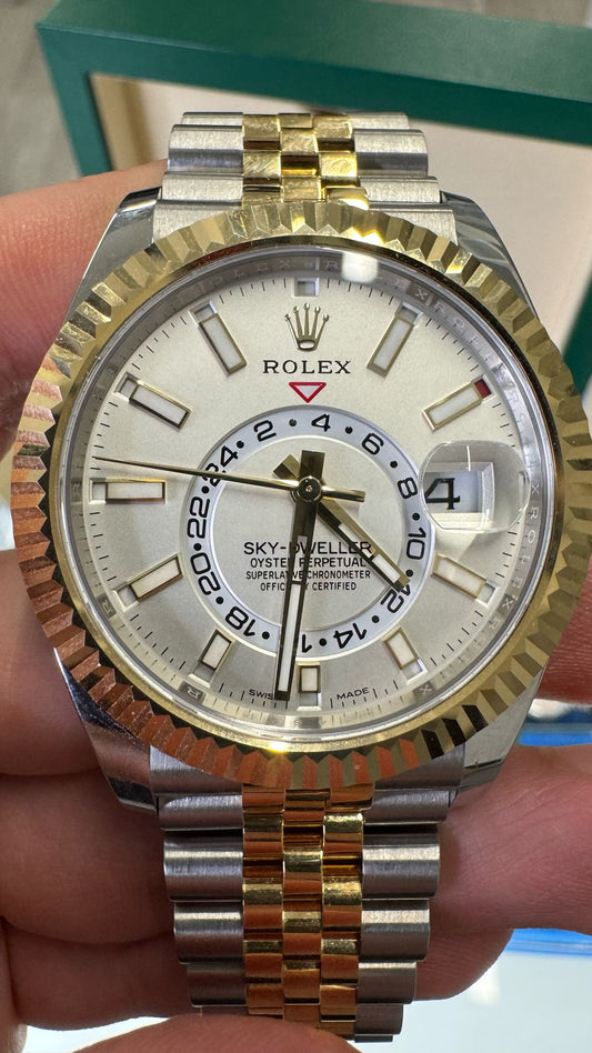 Rolex Stainless Steel and Yellow Gold Sky Dweller Watch - 42 MM - Jubilee Bracelet - Fluted Ring Command Bezel - White Index Dial - 336933 wij