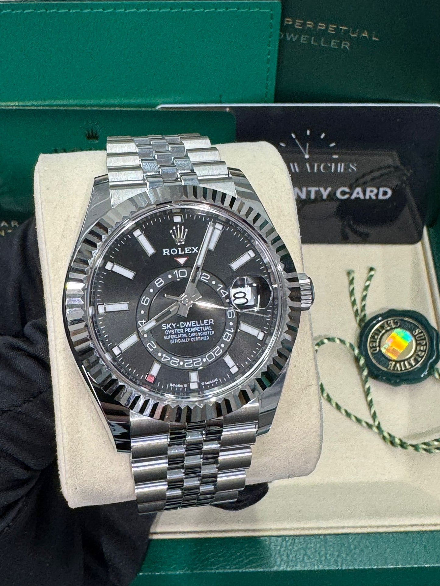 Rolex Stainless Steel and White Gold Sky Dweller Watch - 42 MM - Jubilee Bracelet - Fluted Ring Command Bezel - Black Index Dial - 336934 bkij