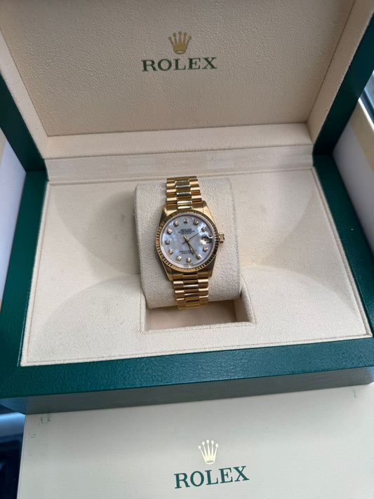 Rolex Datejust - 26 MM - Yellow Gold - Jubilee Bracelet - Fluted Bezel - White Diamond Dial - 69178