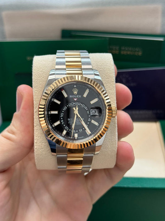 Rolex_-_Skydweller_-_42_MM_-_Yellow_Gold_-_Black_Index_Dial_-_Fluted_Bezel_-_Oyster_Bracelet_-_336933