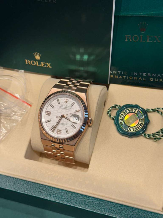 Rolex Land-Dweller - 40 MM - Rose Gold - Honeycomb Motif Intense White Dial - Fluted Bezel - Jubilee Bracelet - 127335-0001