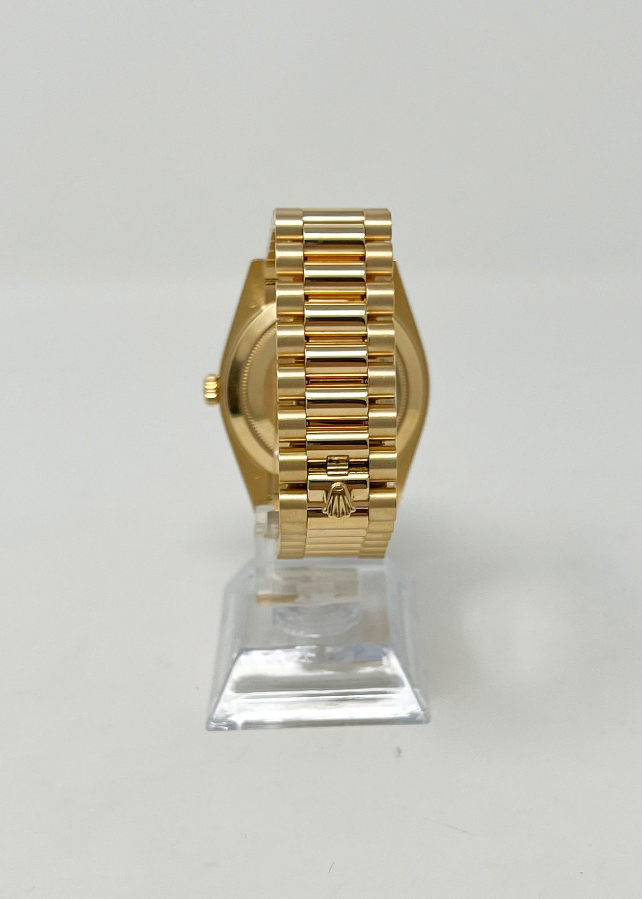 Rolex Yellow Gold Day-Date 40 MM - President Bracelet - Diamond Bezel - Champagne Baguette Diamond Dial - 228348RBR-0002