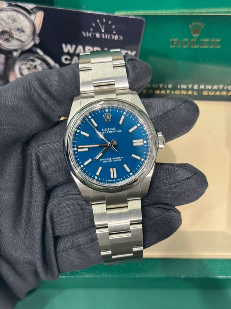Rolex Oyster Perpetual - Stainless Steel - 41 MM - Oyster Bracelet - Med Blue Dial - Domed Bezel - 134300-0009