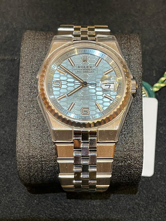 Rolex Land-Dweller - 36 MM - Platinum - Honeycomb Motif Ice Blue Dial - Fluted Bezel - Jubilee Bracelet - 127236-0001