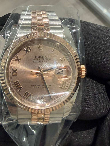 Rolex Stainless Steel And Pink Gold Datejust - 36 MM - Jubilee Bracelet - Fluted Bezel - Pink Roman Dial - 116231-0089