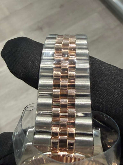 Rolex Stainless Steel And Pink Gold Datejust - 36 MM - Jubilee Bracelet - Fluted Bezel - Pink Roman Dial - 116231-0089