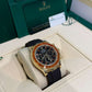 Rolex Yellow Gold Daytona Watch - 40 MM - Oysterflex Strap - Black Diamond Dial - Orange Baguette Sapphire Bezel - 116588SACO