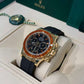 Rolex Yellow Gold Daytona Watch - 40 MM - Oysterflex Strap - Black Diamond Dial - Orange Baguette Sapphire Bezel - 116588SACO