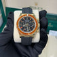 Rolex Yellow Gold Daytona Watch - 40 MM - Oysterflex Strap - Black Diamond Dial - Orange Baguette Sapphire Bezel - 116588SACO