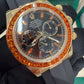 Rolex Yellow Gold Daytona Watch - 40 MM - Oysterflex Strap - Black Diamond Dial - Orange Baguette Sapphire Bezel - 116588SACO