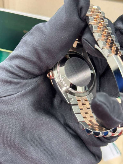 Rolex Stainless Steel And Pink Gold Datejust - 36 MM - Jubilee Bracelet - Fluted Bezel - Mother of Pearl Diamond Dial - 126231-0021