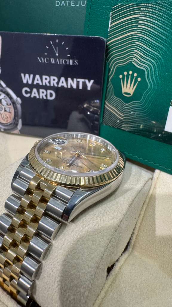 Rolex Stainless Steel And Yellow Gold Datejust - 36 MM - Jubilee Bracelet - Fluted Bezel - Champagne Diamond Dial - 126233 chdj