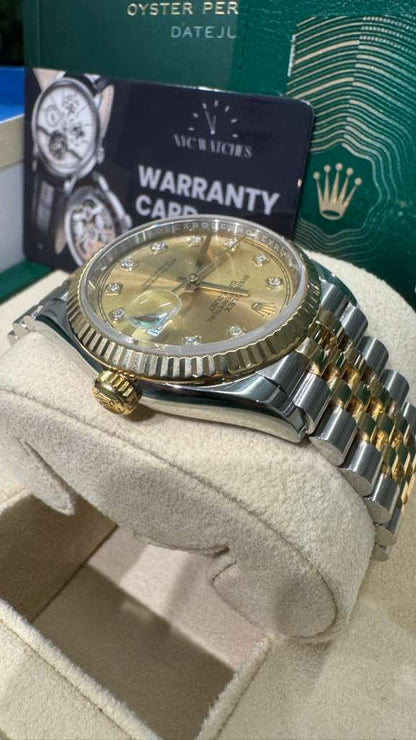 Rolex Stainless Steel And Yellow Gold Datejust - 36 MM - Jubilee Bracelet - Fluted Bezel - Champagne Diamond Dial - 126233-0017