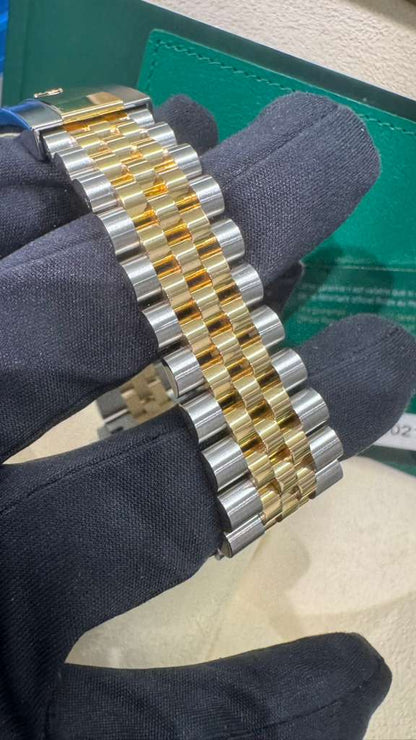 Rolex Stainless Steel And Yellow Gold Datejust - 36 MM - Jubilee Bracelet - Fluted Bezel - Champagne Diamond Dial - 126233-0017