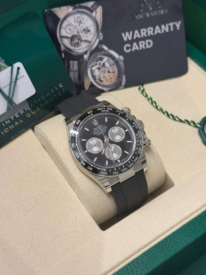 Rolex White Gold Cosmograph Daytona Watch - 40 MM - Oysterflex Strap - Black Ceramic Bezel - Black And Steel Index Dial - 126519LN-0002