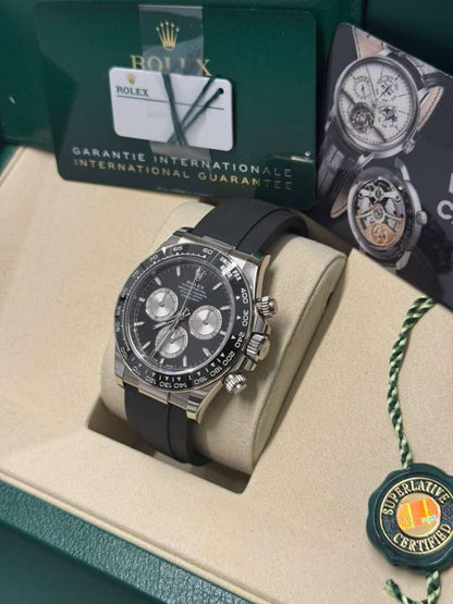 Rolex White Gold Cosmograph Daytona Watch - 40 MM - Oysterflex Strap - Black Ceramic Bezel - Black And Steel Index Dial - 126519LN-0002