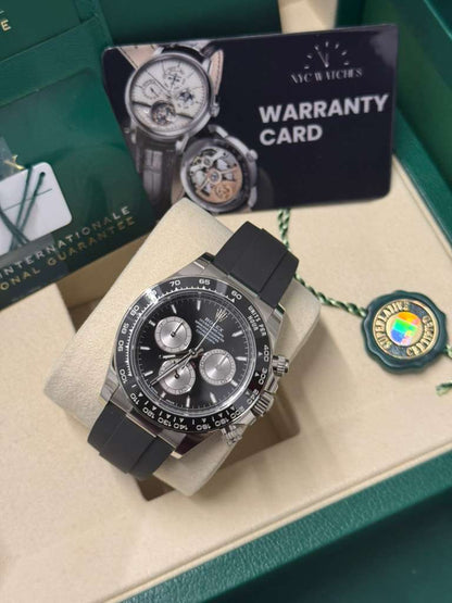 Rolex White Gold Cosmograph Daytona Watch - 40 MM - Oysterflex Strap - Black Ceramic Bezel - Black And Steel Index Dial - 126519LN-0002