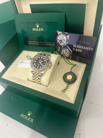Rolex Steel and Yellow Gold Yellow Rolesor GMT-Master II Watch - 40 MM - Jubilee Bracelet - Bidirectional Rotatable Bezel - Black Dial - 126713GRNR-0001