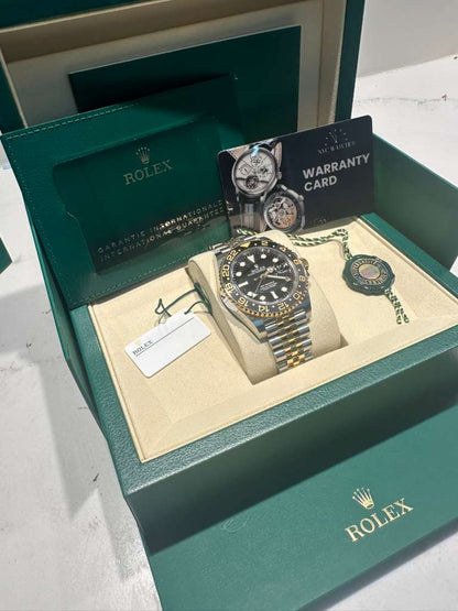 Rolex Steel and Yellow Gold Yellow Rolesor GMT-Master II Watch - 40 MM - Jubilee Bracelet - Bidirectional Rotatable Bezel - Black Dial - 126713GRNR-0001