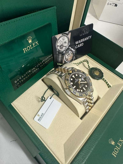 Rolex Steel and Yellow Gold Yellow Rolesor GMT-Master II Watch - 40 MM - Jubilee Bracelet - Bidirectional Rotatable Bezel - Black Dial - 126713GRNR-0001