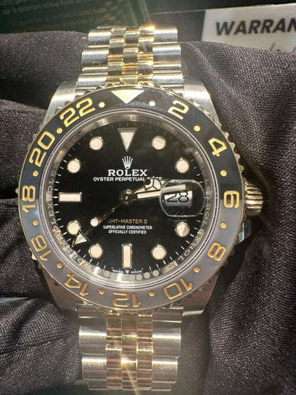 Rolex Steel and Yellow Gold Yellow Rolesor GMT-Master II Watch - 40 MM - Jubilee Bracelet - Bidirectional Rotatable Bezel - Black Dial - 126713GRNR-0001