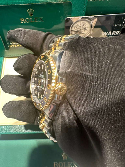 Rolex Steel and Yellow Gold Yellow Rolesor GMT-Master II Watch - 40 MM - Jubilee Bracelet - Bidirectional Rotatable Bezel - Black Dial - 126713GRNR-0001