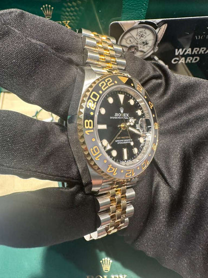 Rolex Steel and Yellow Gold Yellow Rolesor GMT-Master II Watch - 40 MM - Jubilee Bracelet - Bidirectional Rotatable Bezel - Black Dial - 126713GRNR-0001