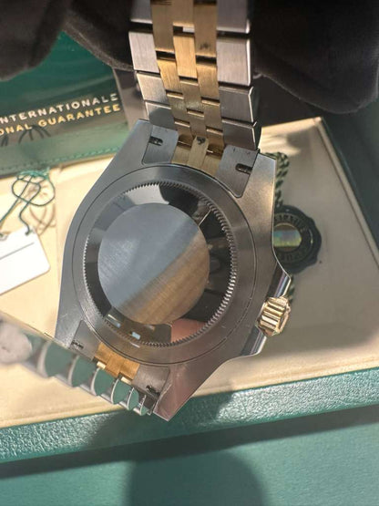 Rolex Steel and Yellow Gold Yellow Rolesor GMT-Master II Watch - 40 MM - Jubilee Bracelet - Bidirectional Rotatable Bezel - Black Dial - 126713GRNR-0001