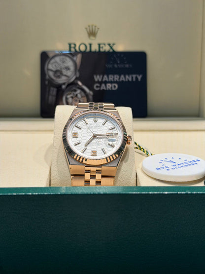 Rolex Land-Dweller - 40 MM - Rose Gold - Honeycomb Motif Intense White Dial - Fluted Bezel - Jubilee Bracelet - 127235-0001