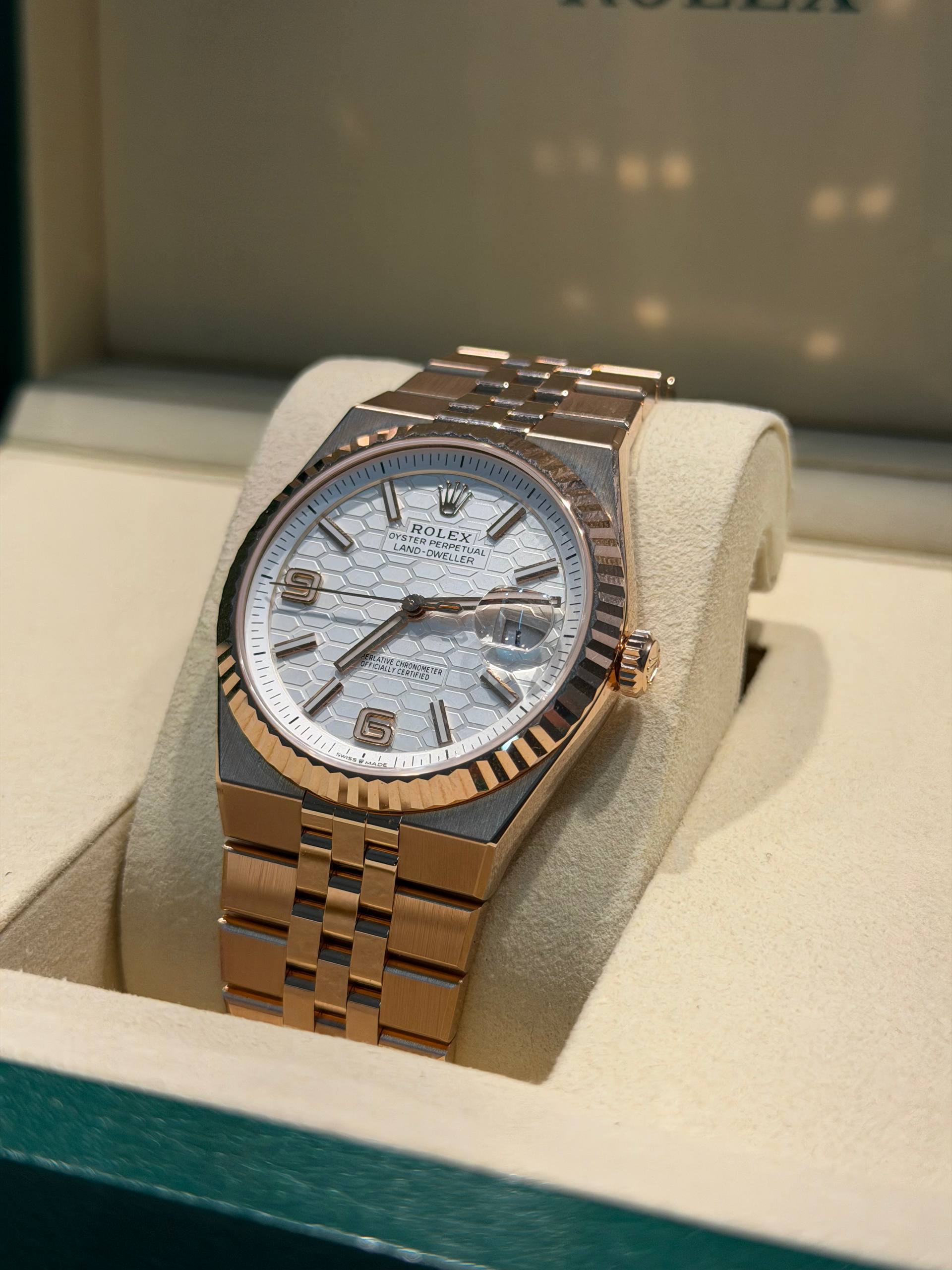 Rolex Land-Dweller - 40 MM - Rose Gold - Honeycomb Motif Intense White Dial - Fluted Bezel - Jubilee Bracelet - 127235-0001
