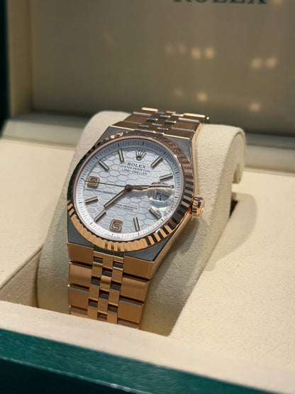 Rolex Land-Dweller - 40 MM - Rose Gold - Honeycomb Motif Intense White Dial - Fluted Bezel - Jubilee Bracelet - 127235-0001