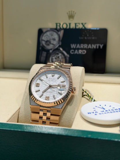 Rolex Land-Dweller - 40 MM - Rose Gold - Honeycomb Motif Intense White Dial - Fluted Bezel - Jubilee Bracelet - 127235-0001