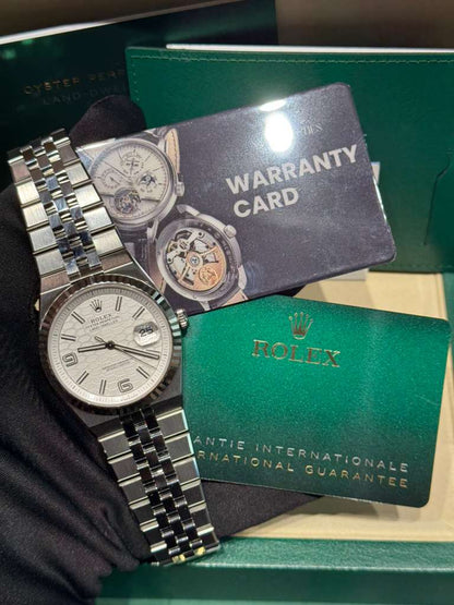 Rolex Land-Dweller - 40 MM - Stainless Steel and White Gold - Honeycomb Motif White Dial - Fluted Bezel - Jubilee Bracelet - 127334-0001