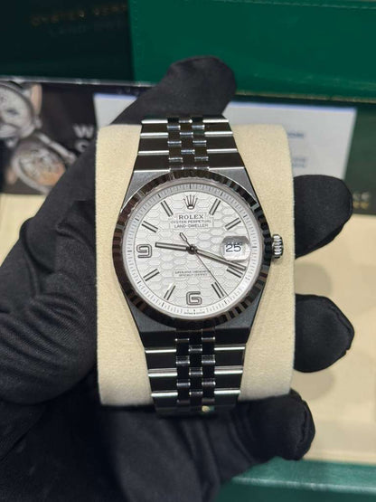 Rolex Land-Dweller - 40 MM - Stainless Steel and White Gold - Honeycomb Motif White Dial - Fluted Bezel - Jubilee Bracelet - 127334-0001