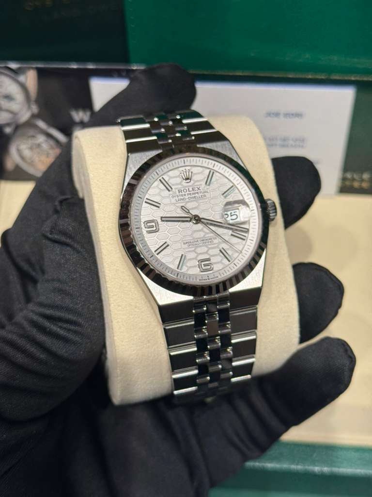 Rolex Land-Dweller - 40 MM - Stainless Steel and White Gold - Honeycomb Motif White Dial - Fluted Bezel - Jubilee Bracelet - 127334-0001