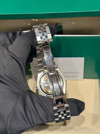 Rolex Land-Dweller - 40 MM - Stainless Steel and White Gold - Honeycomb Motif White Dial - Fluted Bezel - Jubilee Bracelet - 127334-0001