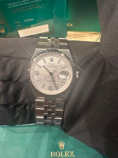 Rolex Land-Dweller - 40 MM - Stainless Steel and White Gold - Honeycomb Motif White Dial - Fluted Bezel - Jubilee Bracelet - 127334-0001