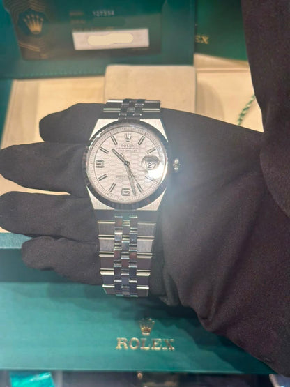 Rolex Land-Dweller - 40 MM - Stainless Steel and White Gold - Honeycomb Motif White Dial - Fluted Bezel - Jubilee Bracelet - 127334-0001