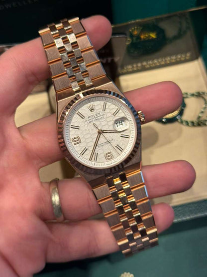 Rolex Land-Dweller - 40 MM - Rose Gold - Honeycomb Motif Intense White Dial - Fluted Bezel - Jubilee Bracelet - 127335-0001