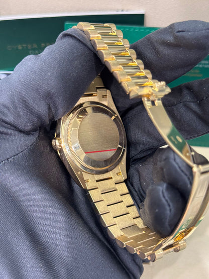 Rolex Day-Date - 36 MM - Yellow Gold - White Roman Dial - 128238-0113