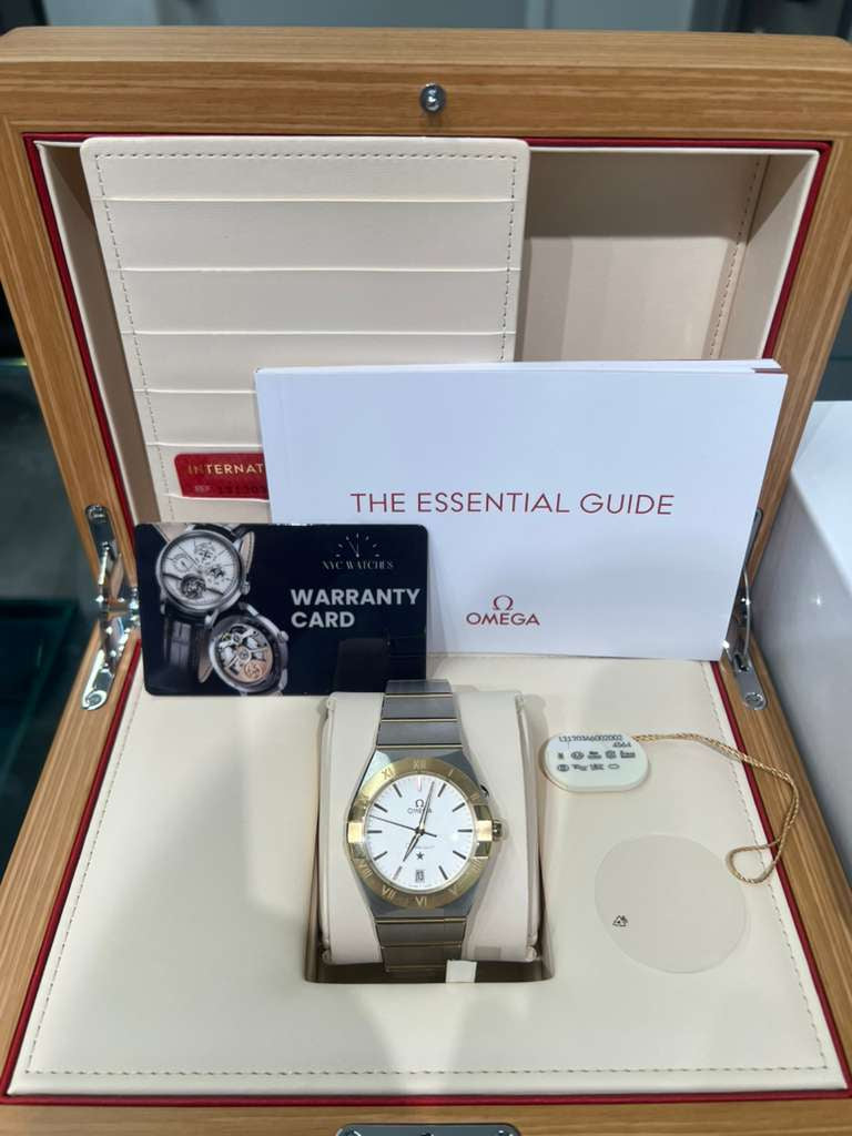 Omega Constellation Stainless Steel and Yellow Gold 36 MM - Stainless Steel and Yellow Gold Bracelet - Opaline Silvery Dial - 131.20.36.60.02.002