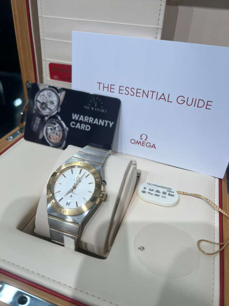 Omega Constellation Stainless Steel and Yellow Gold 36 MM - Stainless Steel and Yellow Gold Bracelet - Opaline Silvery Dial - 131.20.36.60.02.002
