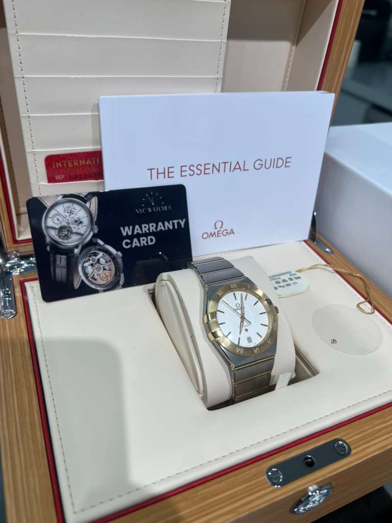 Omega Constellation Stainless Steel and Yellow Gold 36 MM - Stainless Steel and Yellow Gold Bracelet - Opaline Silvery Dial - 131.20.36.60.02.002