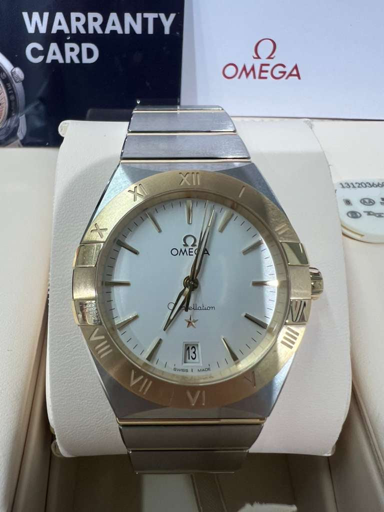 Omega Constellation Stainless Steel and Yellow Gold 36 MM - Stainless Steel and Yellow Gold Bracelet - Opaline Silvery Dial - 131.20.36.60.02.002