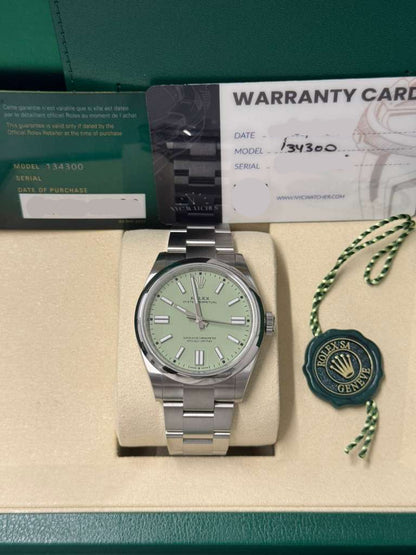 Rolex Oyster Perpetual - Stainless Steel - 41 MM - Oyster Bracelet - Pistachio Dial - Domed Bezel - 134300-0006