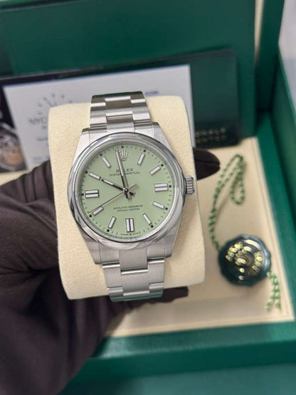 Rolex Oyster Perpetual - Stainless Steel - 41 MM - Oyster Bracelet - Pistachio Dial - Domed Bezel - 134300-0006