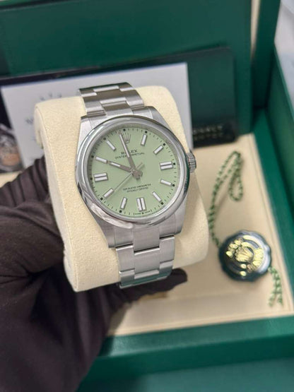 Rolex Oyster Perpetual - Stainless Steel - 41 MM - Oyster Bracelet - Pistachio Dial - Domed Bezel - 134300-0006