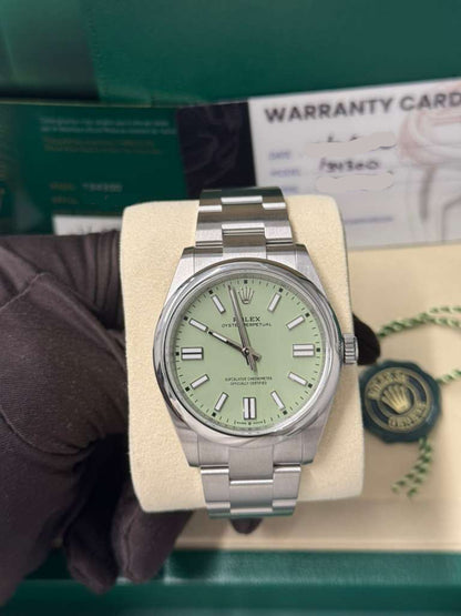 Rolex Oyster Perpetual - Stainless Steel - 41 MM - Oyster Bracelet - Pistachio Dial - Domed Bezel - 134300-0006
