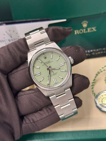 Rolex Oyster Perpetual - Stainless Steel - 41 MM - Oyster Bracelet - Pistachio Dial - Domed Bezel - 134300-0006